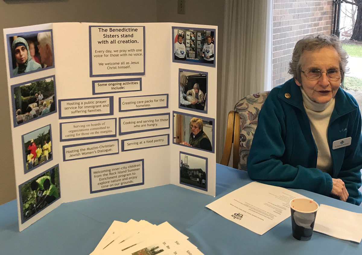 Sister Marianne Burkhard helps at the Listen Up Open House