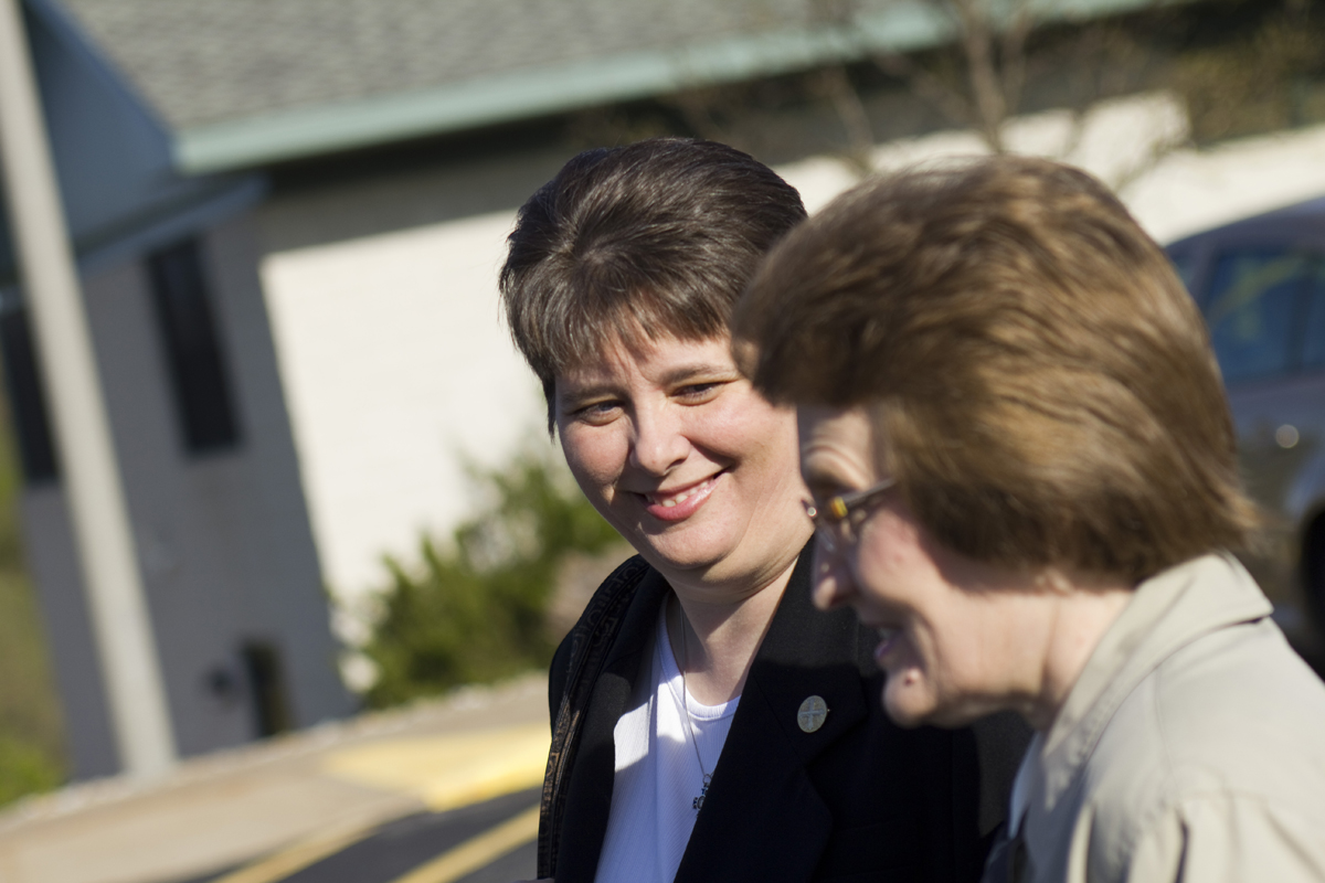 Sisters Stefanie and Jackie walk into their Benedictine Catholic monastery