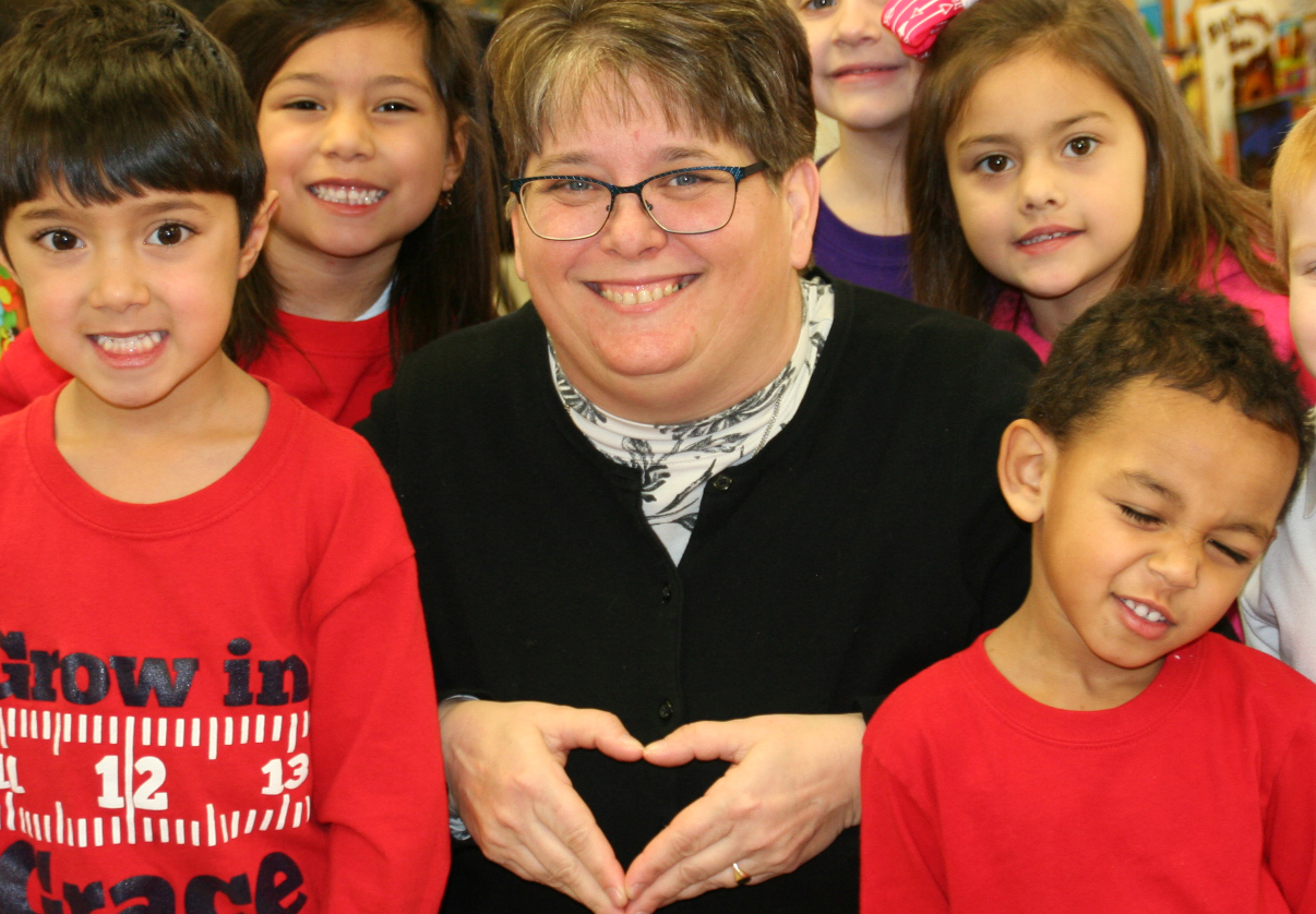 Catholic Benedictine Sister Stefanie MacDonald with preschoolers